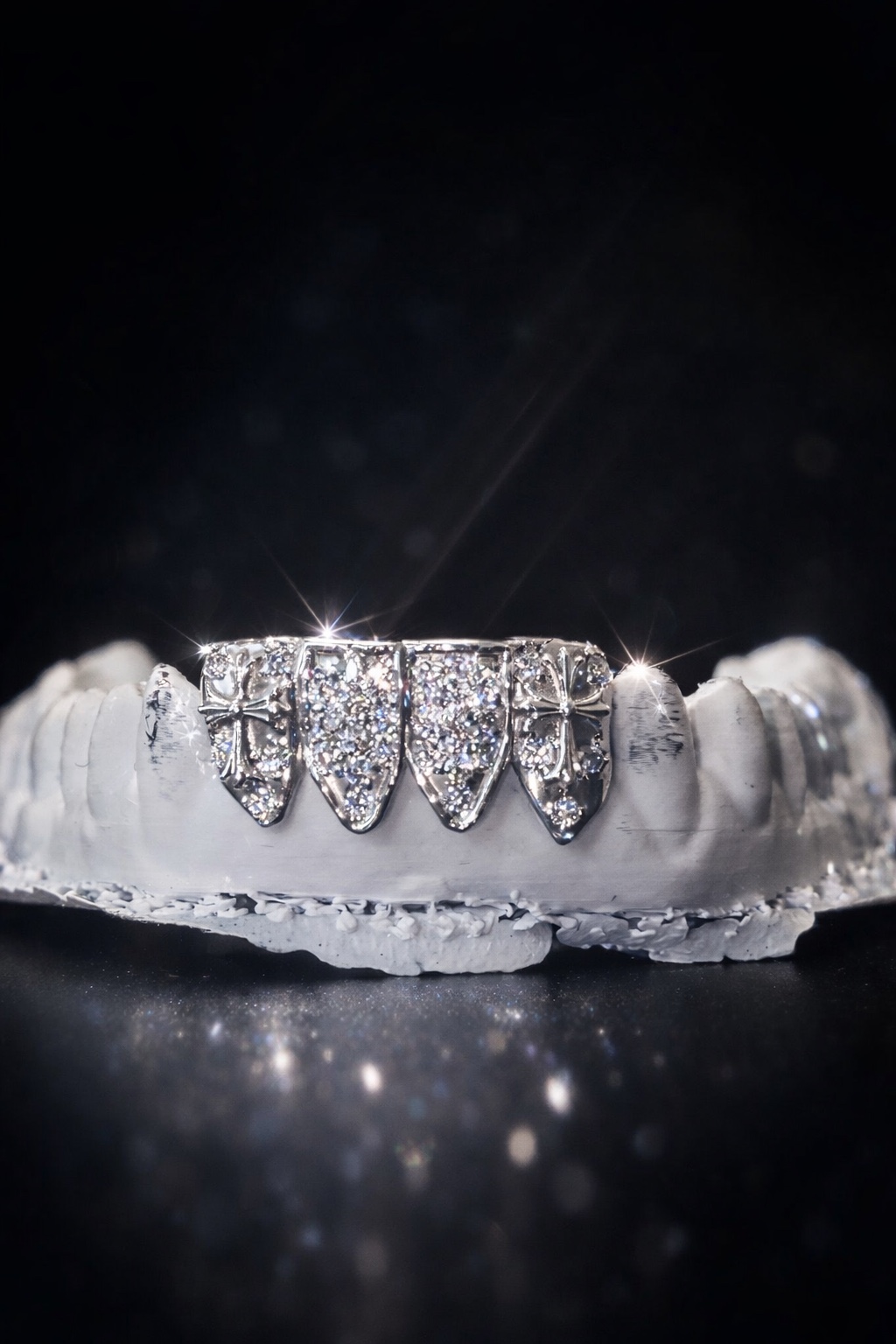 Front view of custom iced grillz with polished cross details made by YZ Jewelers